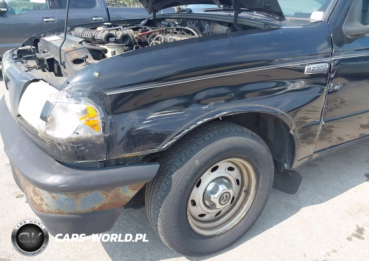 2003 Mazda B2300 VIN:4F4YR12D63TM14294 - 12