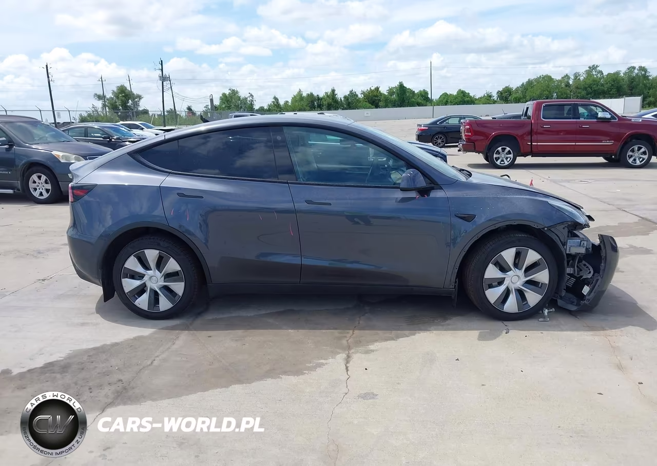 2023 Tesla Model Y VIN:7SAYGDEE1PA090880 - 12