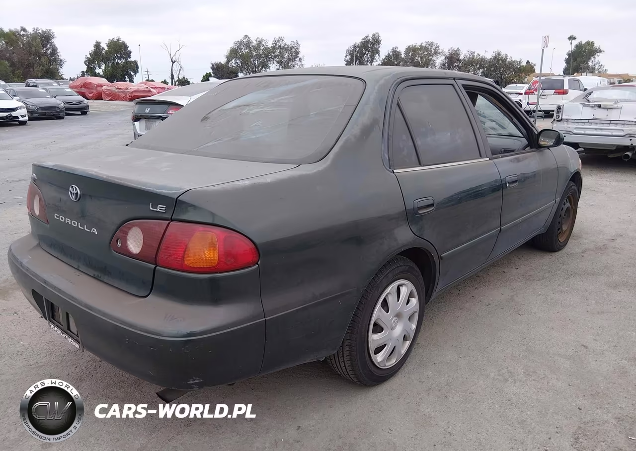 2001 Toyota Corolla Le VIN:1NXBR12E61Z555117 - 4