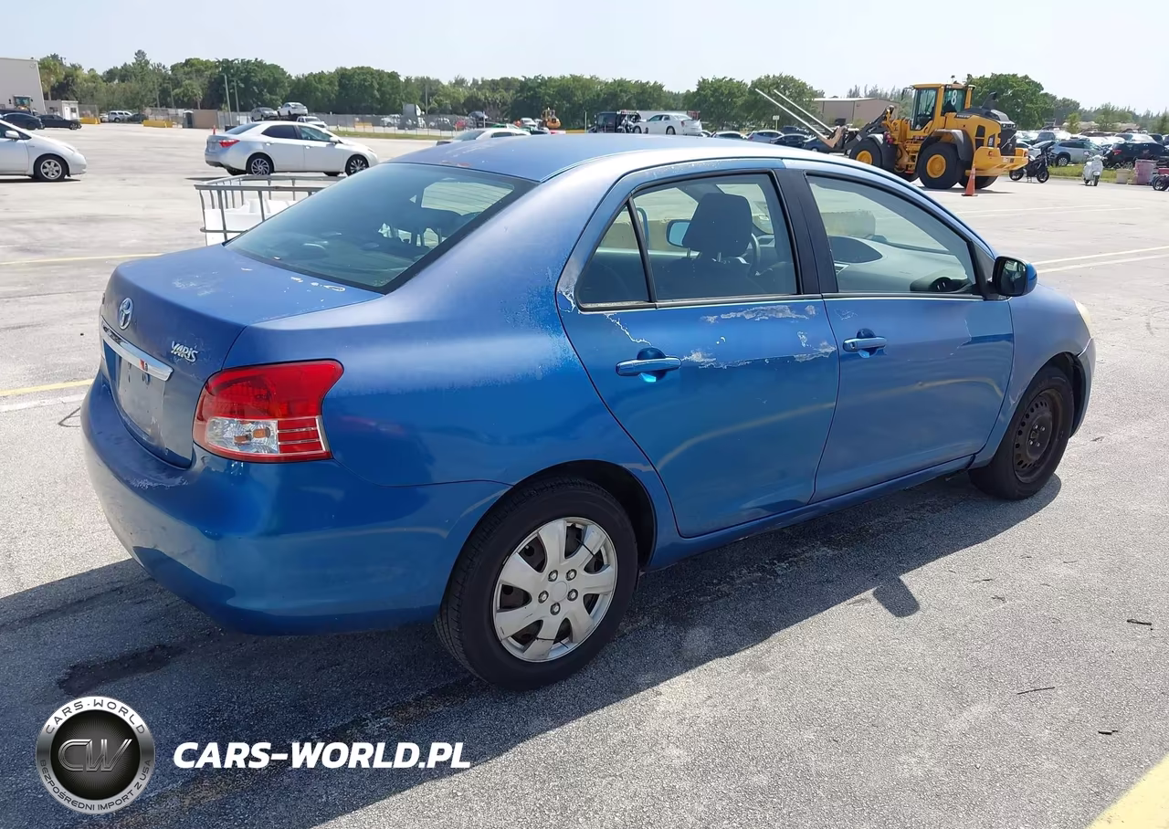 2009 Toyota Yaris VIN:JTDBT903691350027 - 4