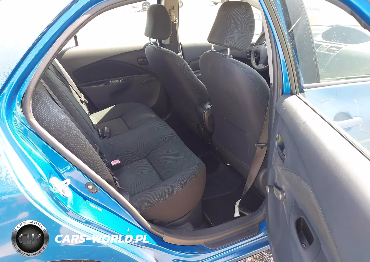 2009 Toyota Yaris VIN:JTDBT903691350027 - 8