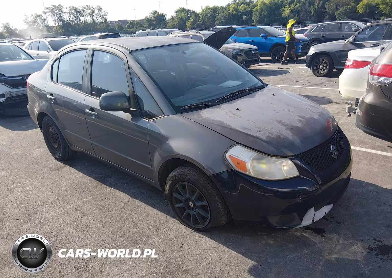 2012 Suzuki Sx4 Le-Le Popular VIN:JS2YC5A38C6303311 - 1