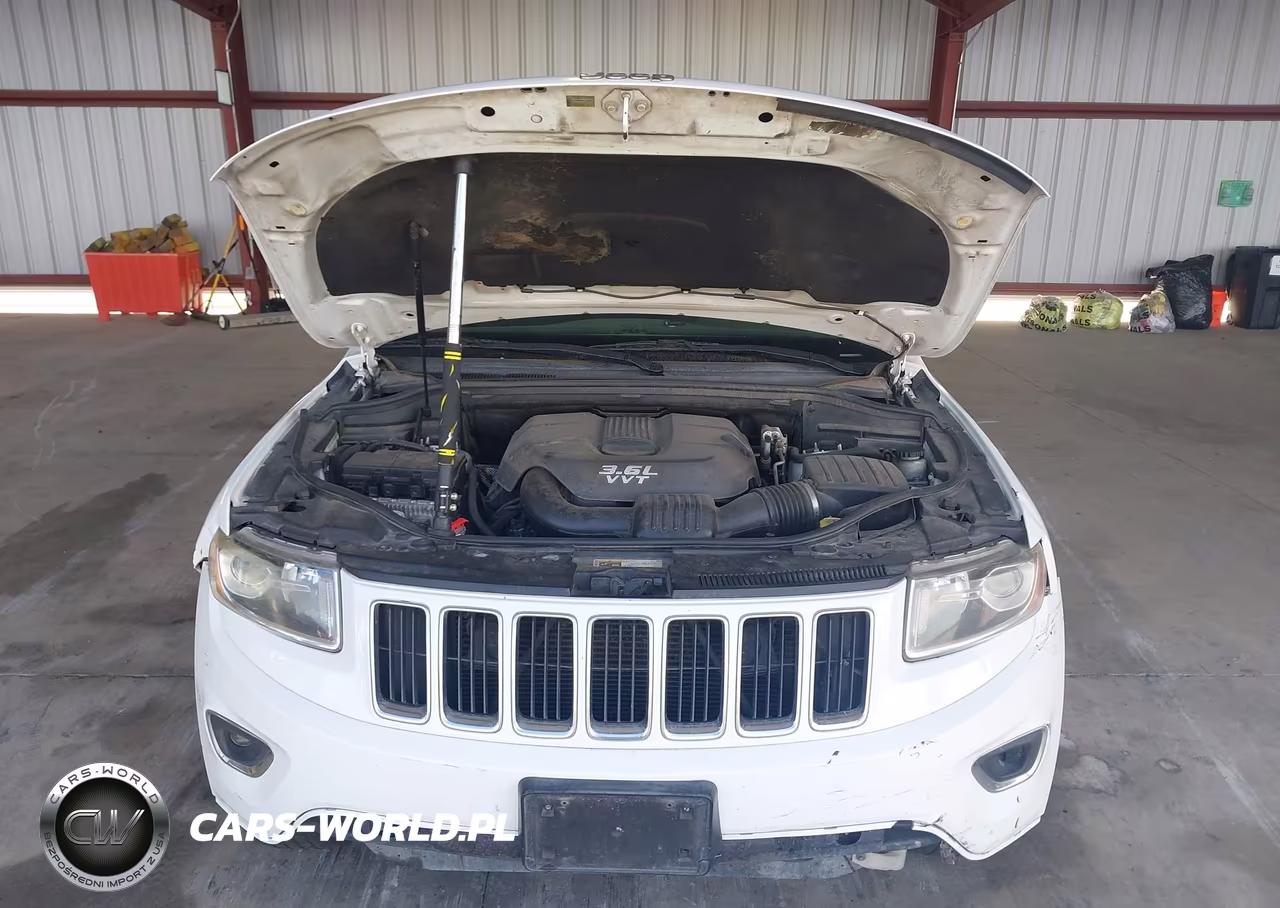 2014 Jeep Grand Cherokee Laredo VIN:1C4RJEAGOEC125437 - 10