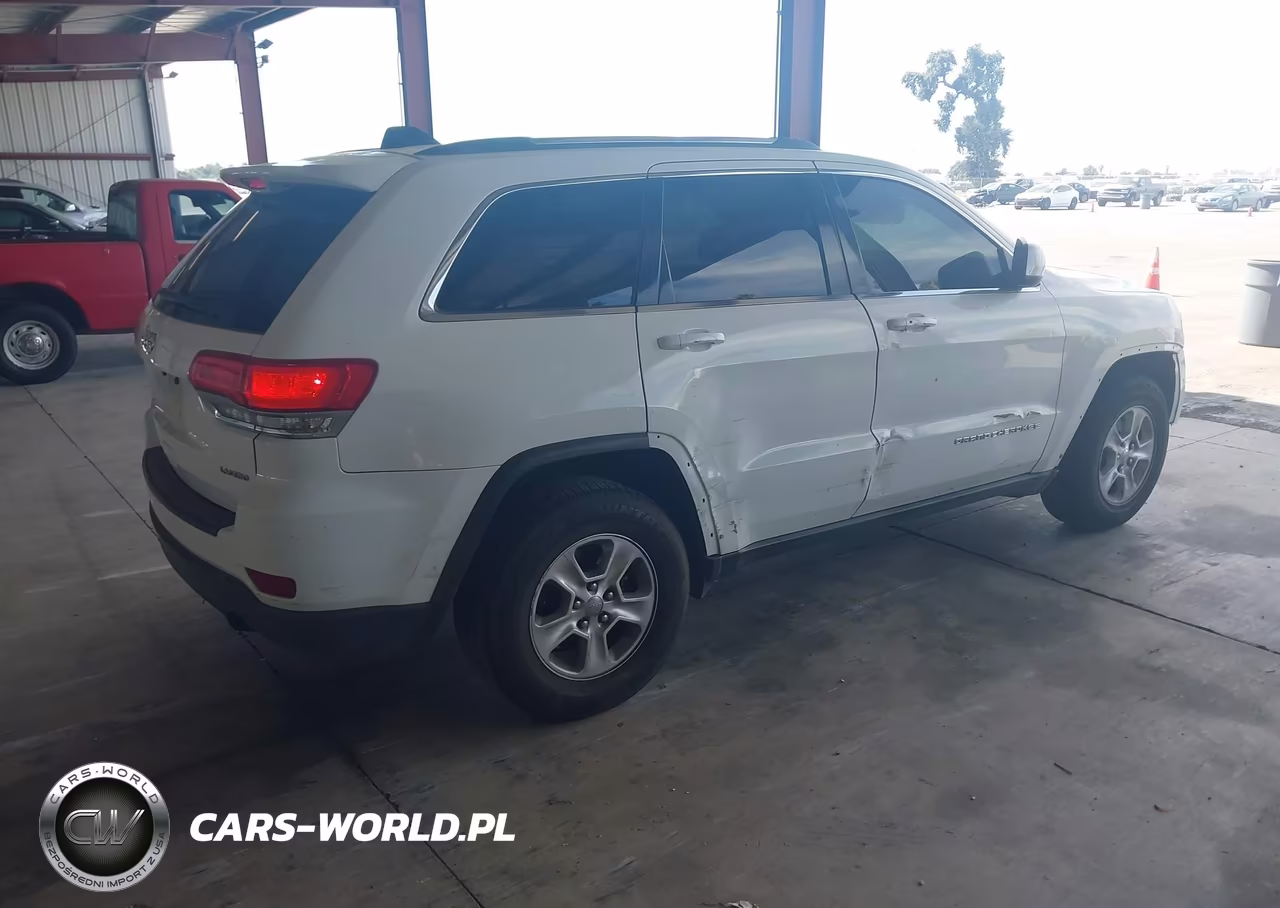 2014 Jeep Grand Cherokee Laredo VIN:1C4RJEAGOEC125437 - 4