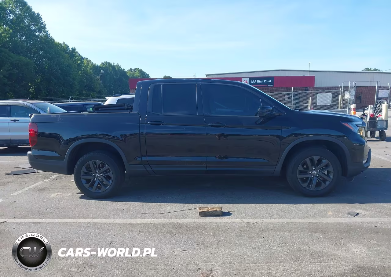 2023 Honda Ridgeline Sport VIN:5FPYK3F15PB049177 - 13