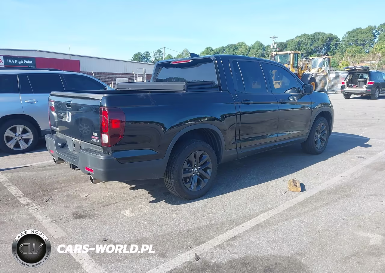 2023 Honda Ridgeline Sport VIN:5FPYK3F15PB049177 - 4