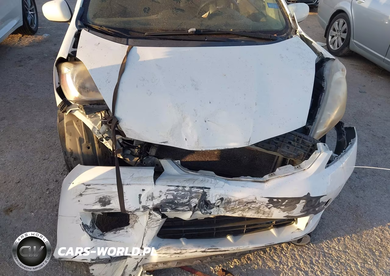 2009 Honda Fit Sport VIN:JHMGE87429C007033 - 12