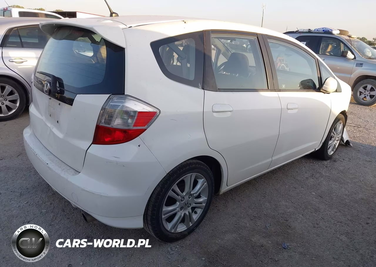 2009 Honda Fit Sport VIN:JHMGE87429C007033 - 4
