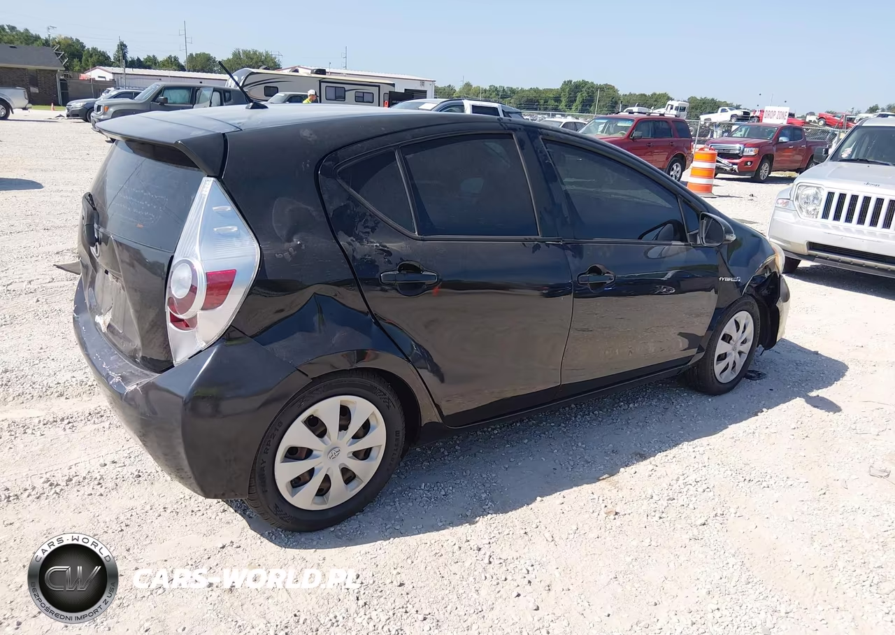 2014 Toyota Prius C Two VIN:JTDKDTB38E1063354 - 4