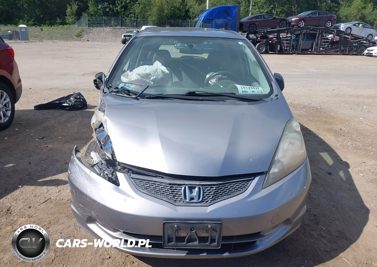 2009 Honda Fit VIN:JHMGE88229S018987 - 12