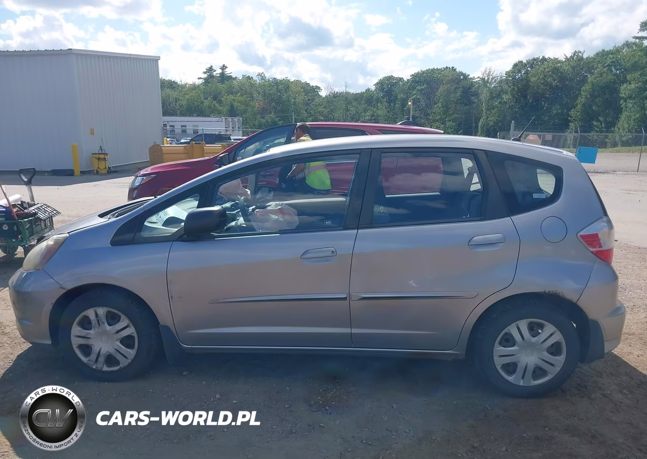 2009 Honda Fit VIN:JHMGE88229S018987 - 13