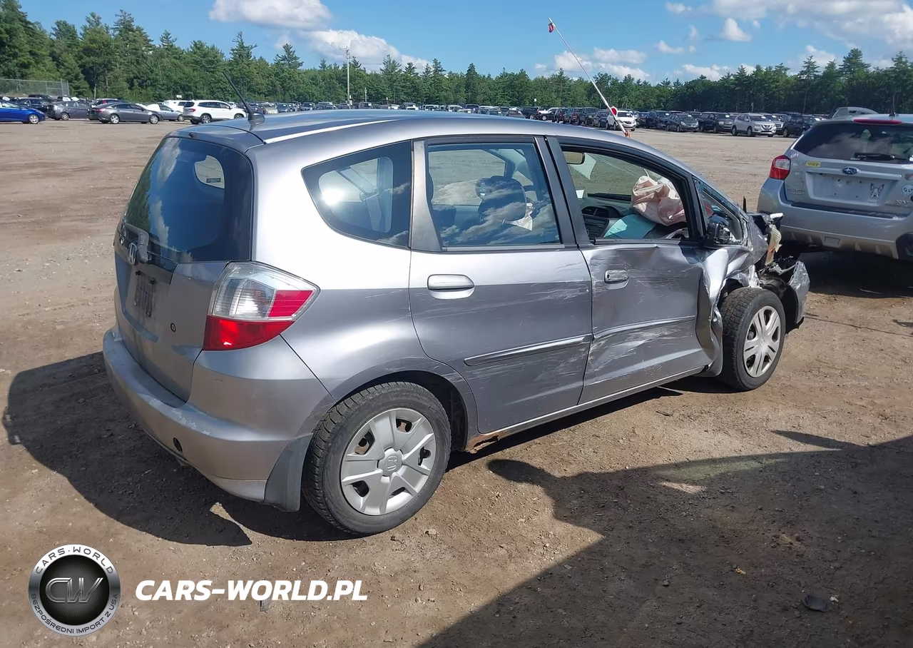2009 Honda Fit VIN:JHMGE88229S018987 - 4