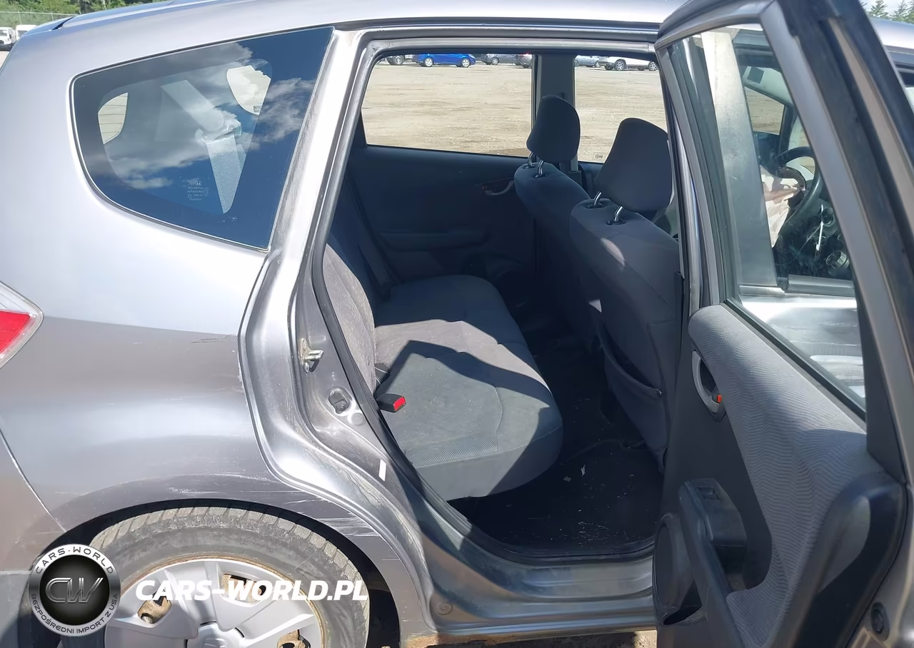 2009 Honda Fit VIN:JHMGE88229S018987 - 8