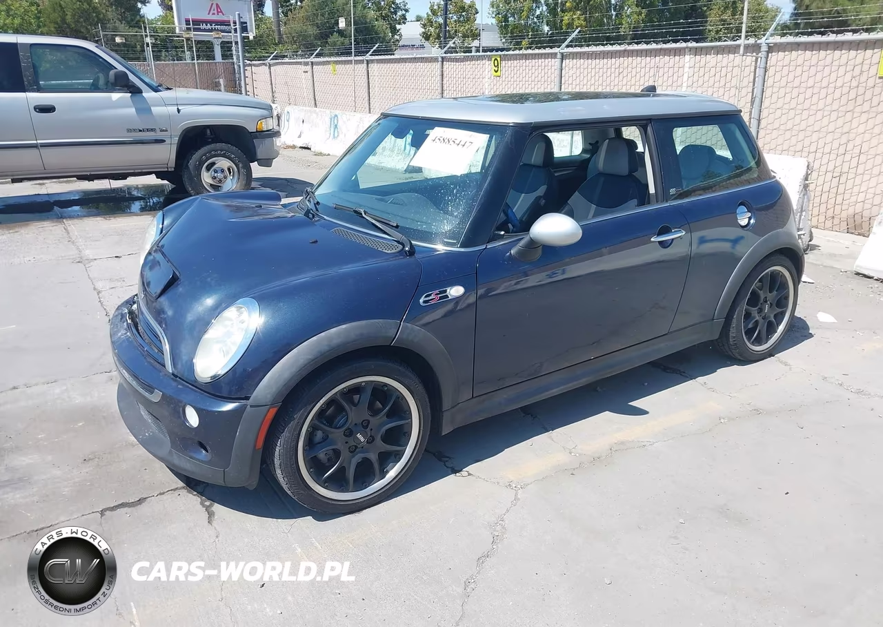2006 Mini Cooper S VIN:WMWRE335X6TL23445 - 2