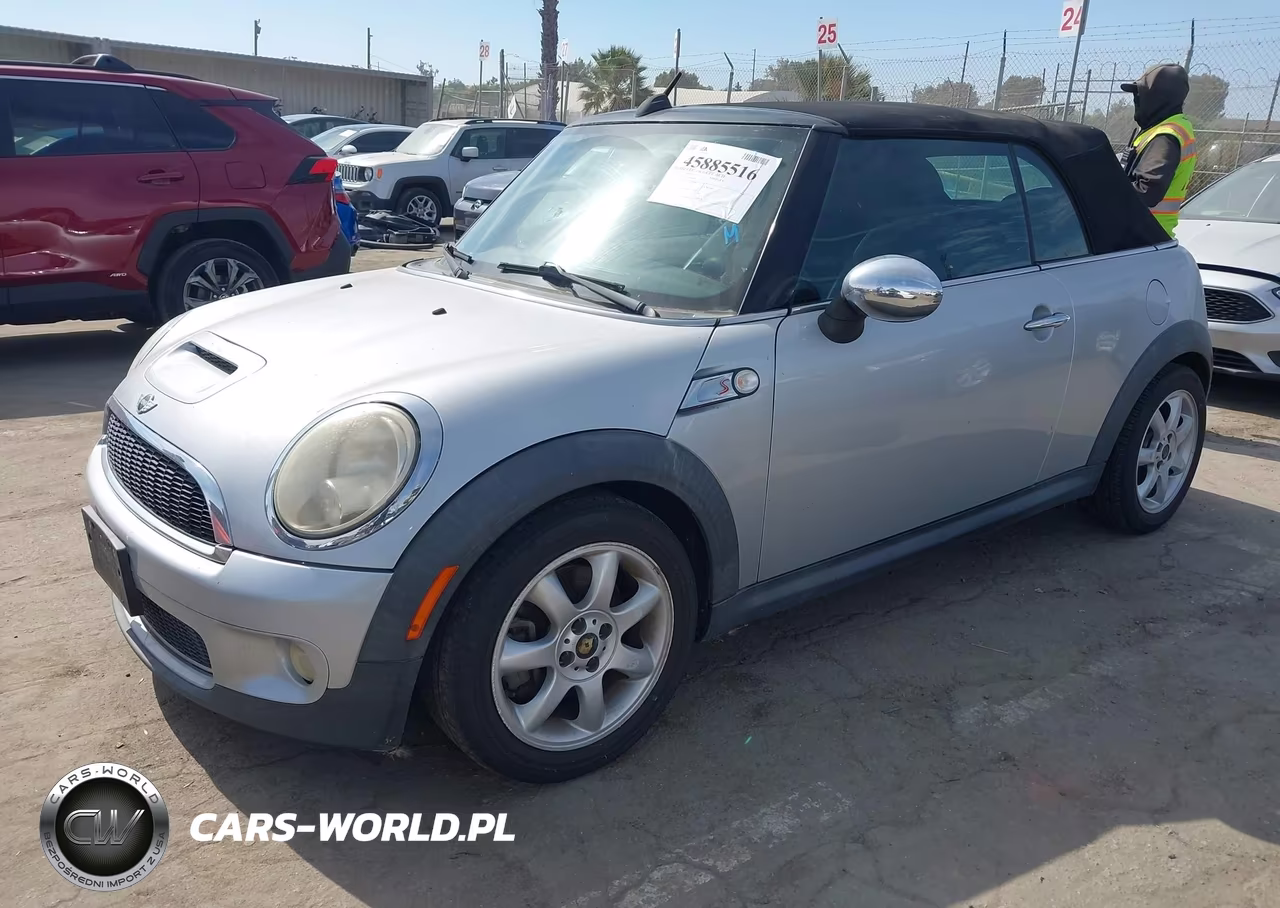 2009 Mini Cooper S VIN:WMWMS33559TG89677 - 2