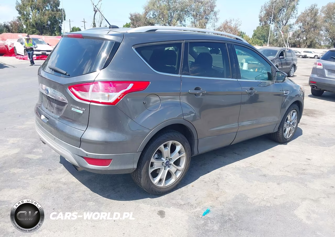 2016 Ford Escape Titanium VIN:1FMCU0JX5GUA30106 - 4