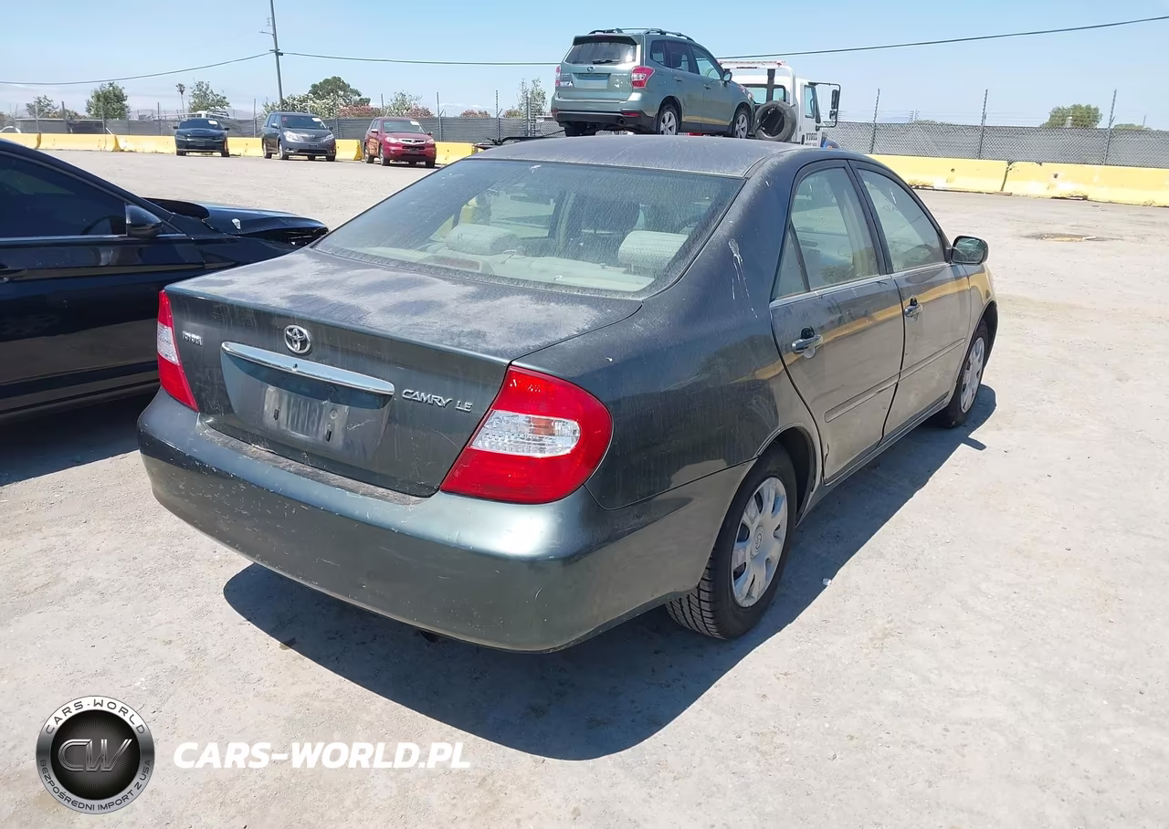 2003 Toyota Camry Le VIN:JTDBE30K030152717 - 4