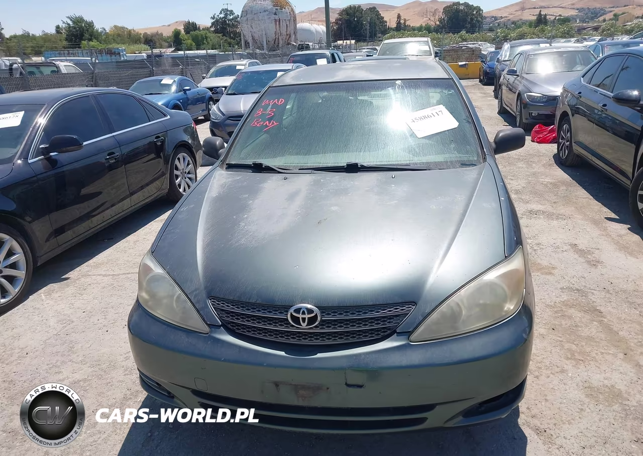 2003 Toyota Camry Le VIN:JTDBE30K030152717 - 6
