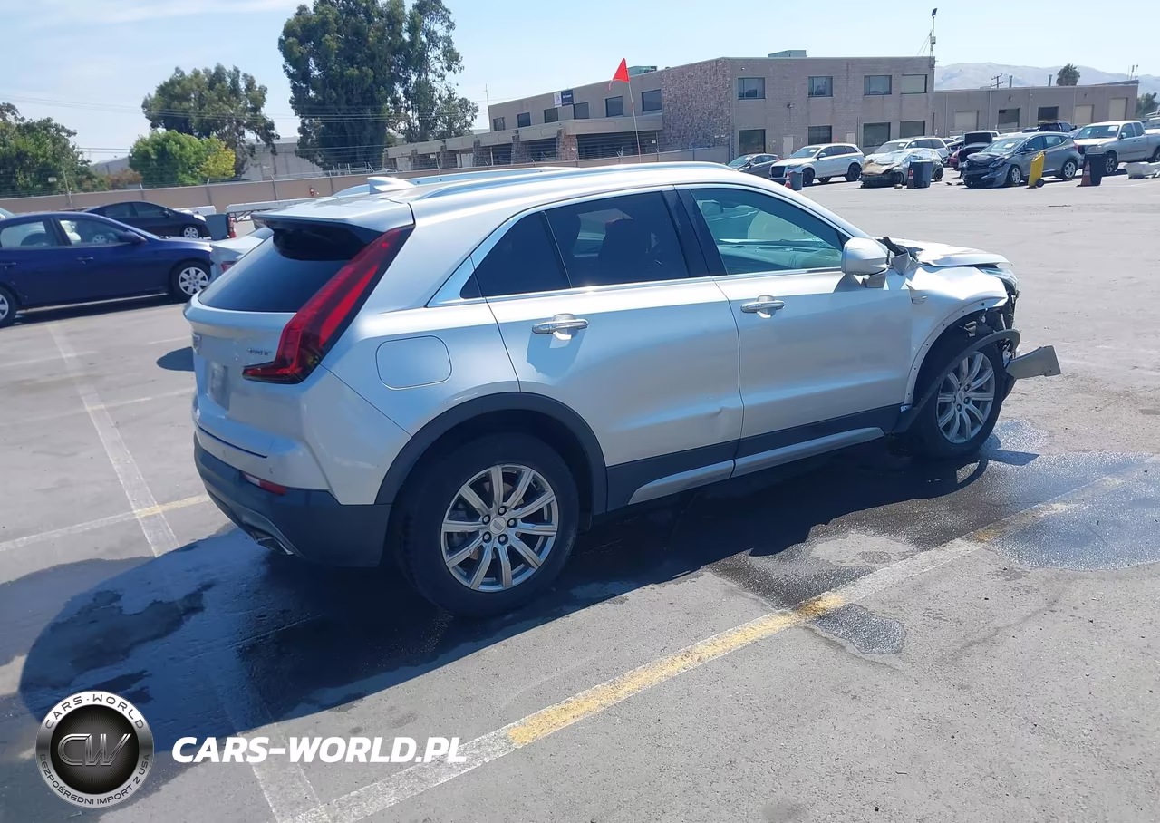 2020 Cadillac Xt4 Fwd Premium Luxury VIN:1GYFZCR40LF027038 - 4