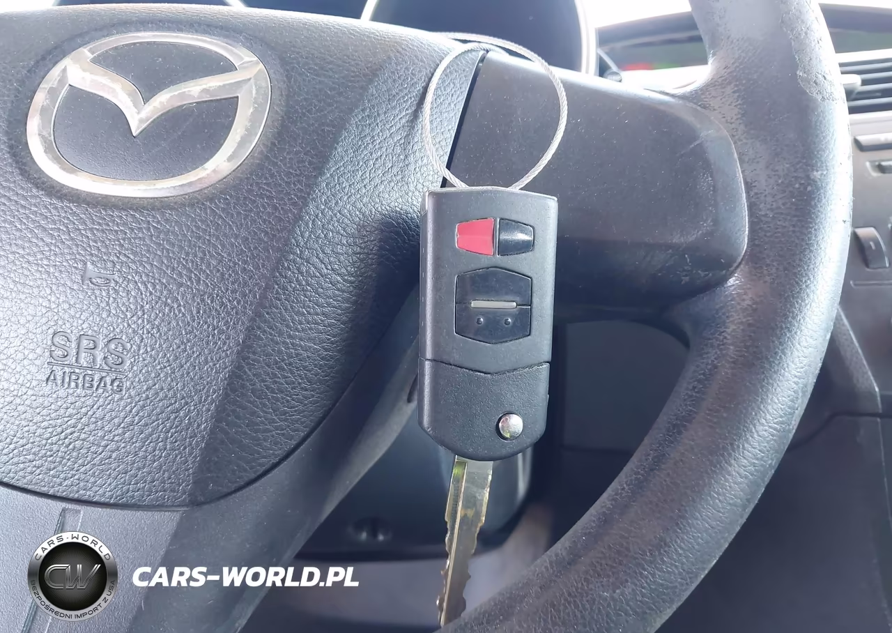 2012 Mazda Mazda3 I Sport VIN:JM1BL1UG0C1542890 - 11