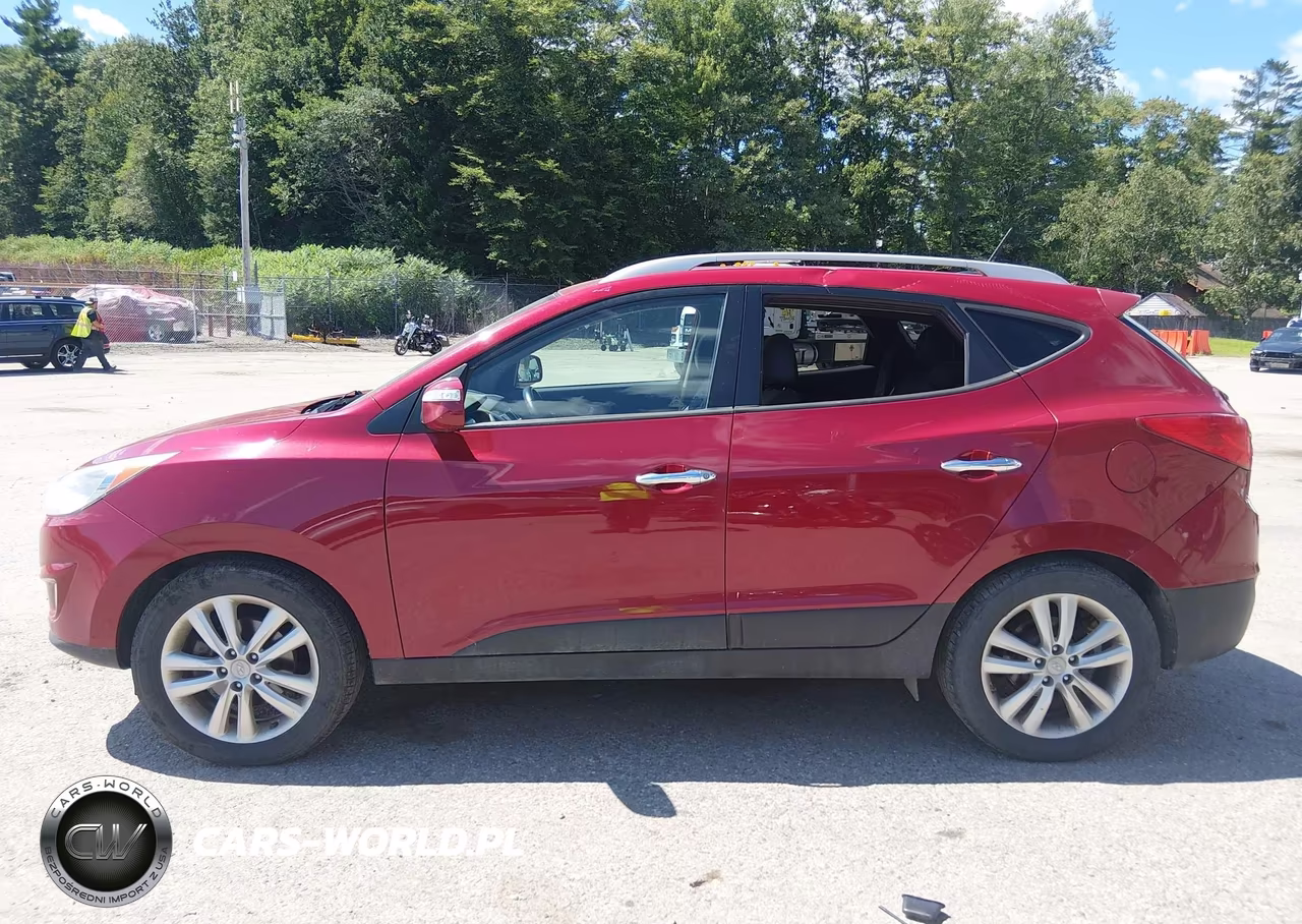 2011 Hyundai Tucson Limited VIN:KM8JUCAC2BU311018 - 14