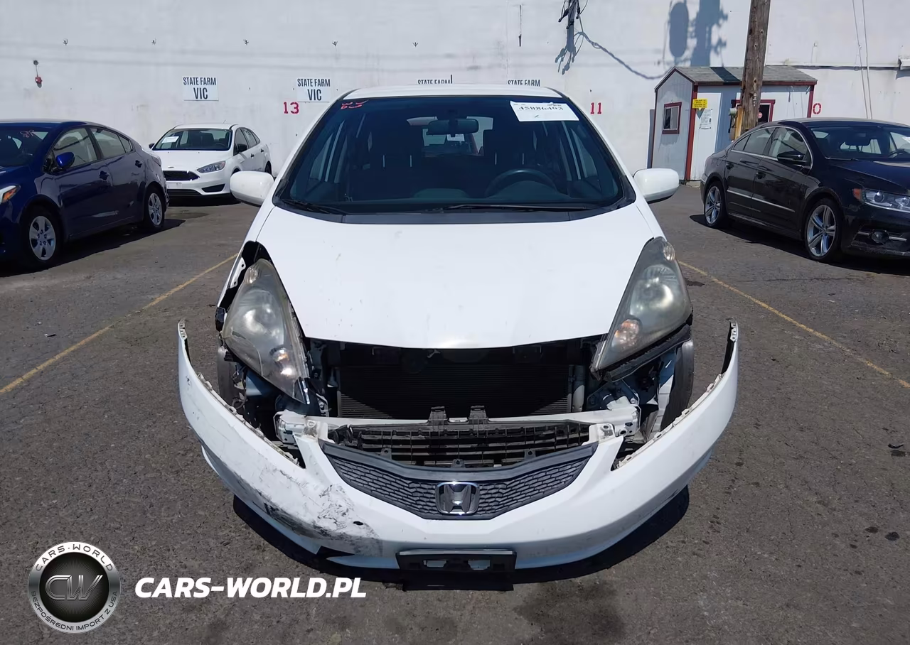 2012 Honda Fit VIN:JHMGE8H35CC024633 - 12