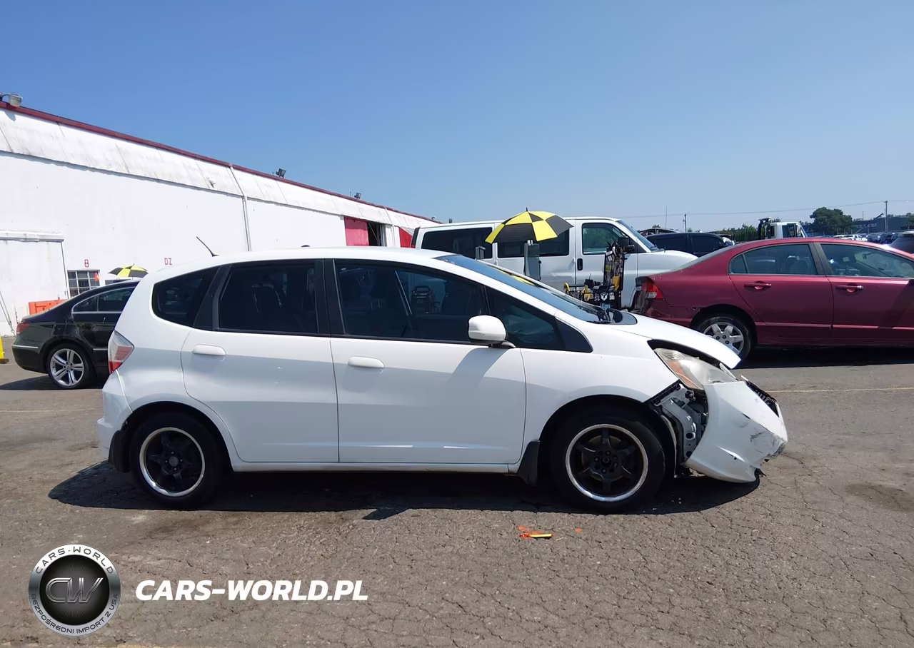 2012 Honda Fit VIN:JHMGE8H35CC024633 - 13