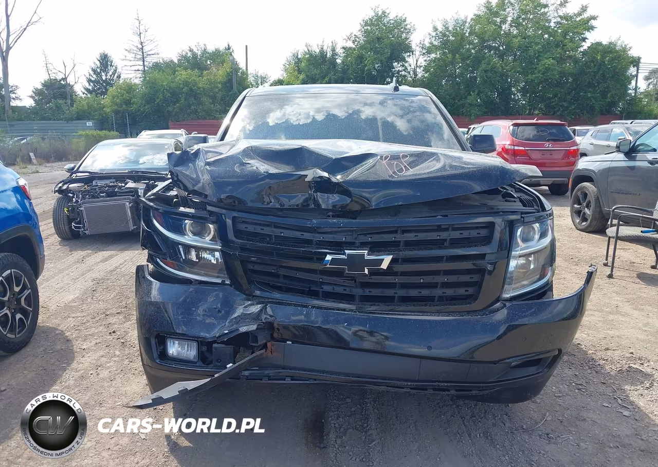 2019 Chevrolet Suburban Premier VIN:1GNSKJKJ2KR184846 - 13
