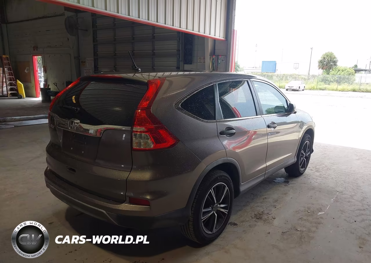 2015 Honda Cr-V Lx VIN:3CZRM3H31FG709580 - 4