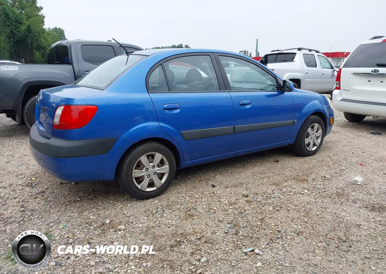 2009 Kia Rio Lx VIN:KNADE223396546935 - 4