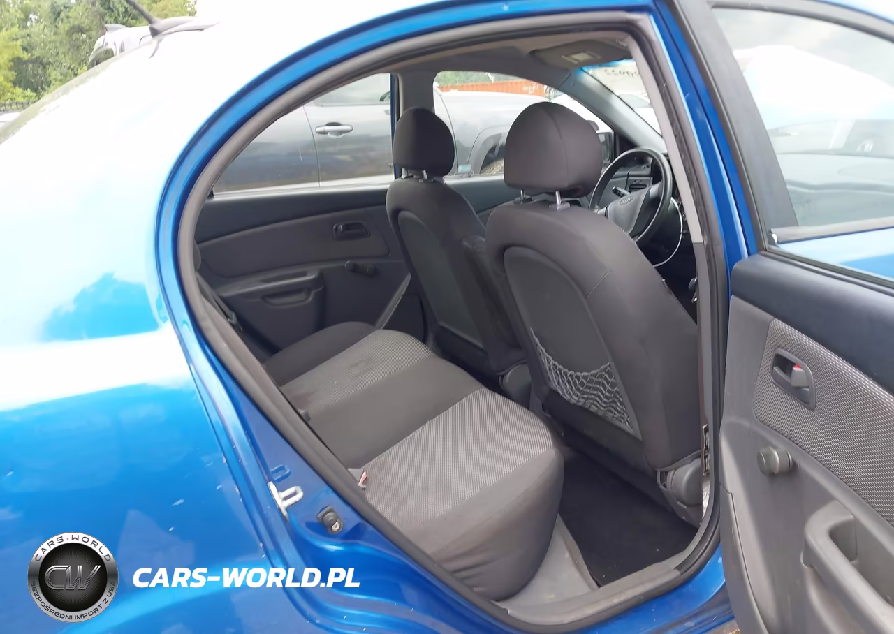 2009 Kia Rio Lx VIN:KNADE223396546935 - 8