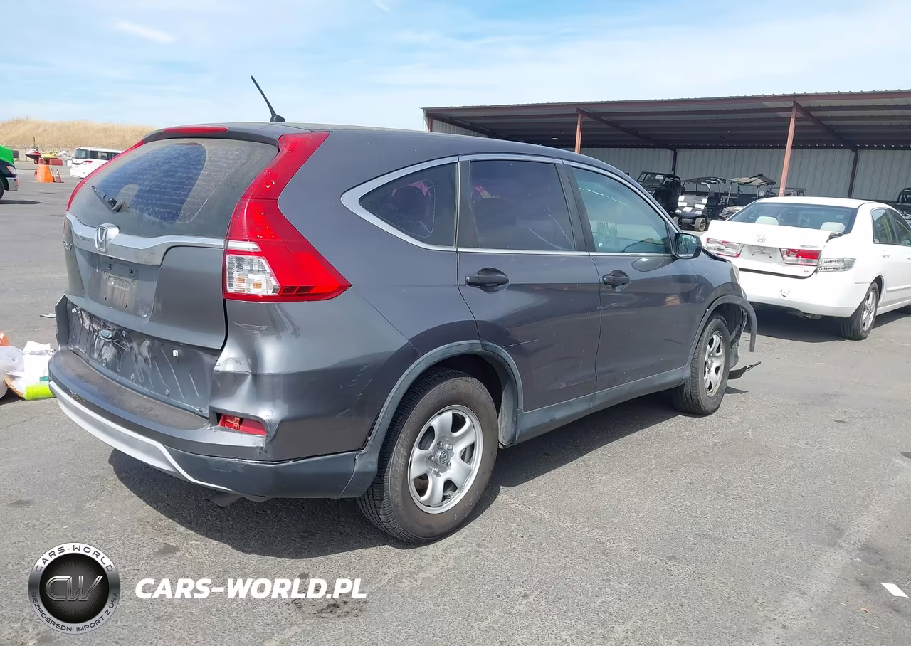 2015 Honda Cr-V Lx VIN:3CZRM3H31FG704928 - 4