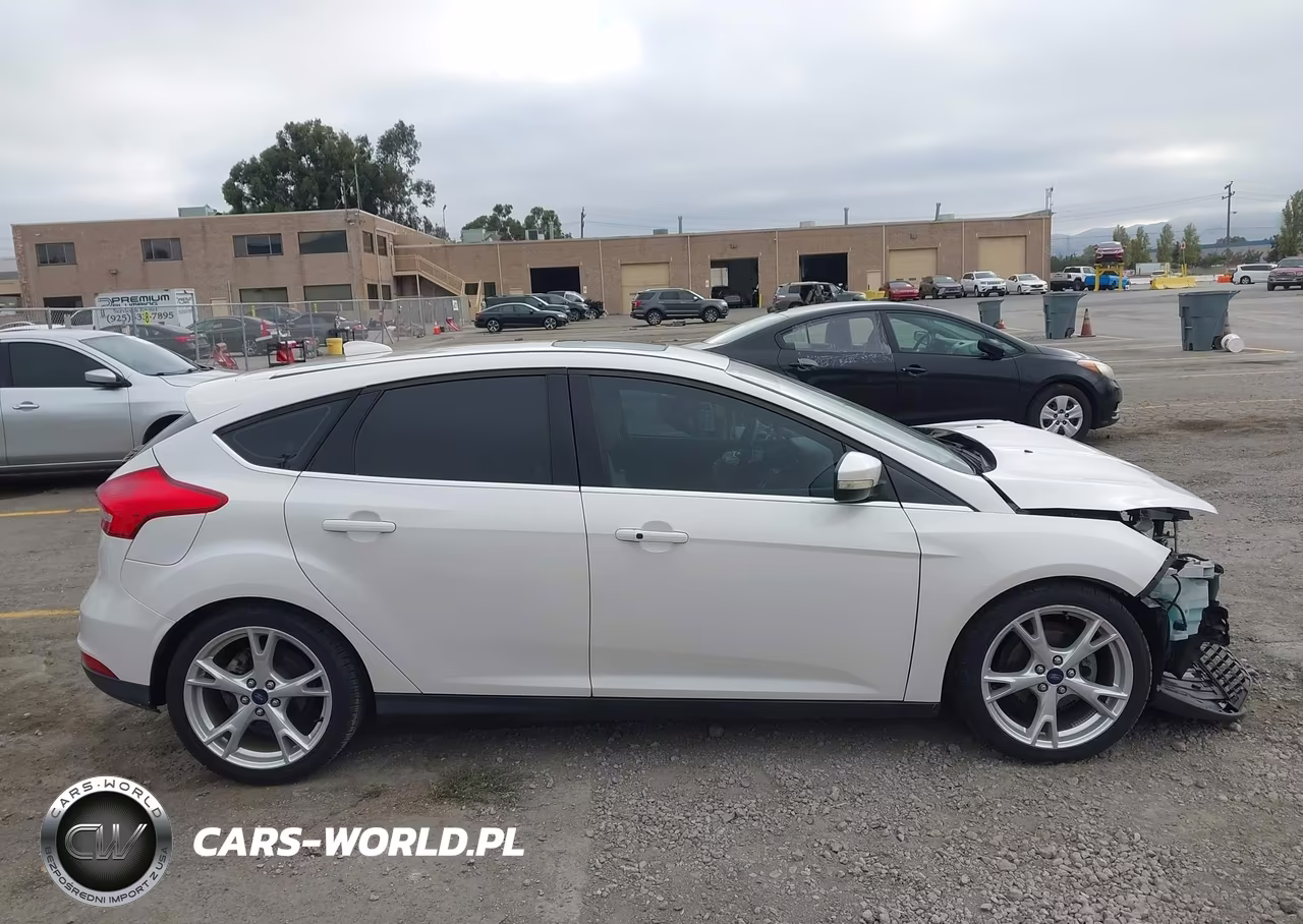 2015 Ford Focus Titanium VIN:1FADP3N22FL341860 - 14