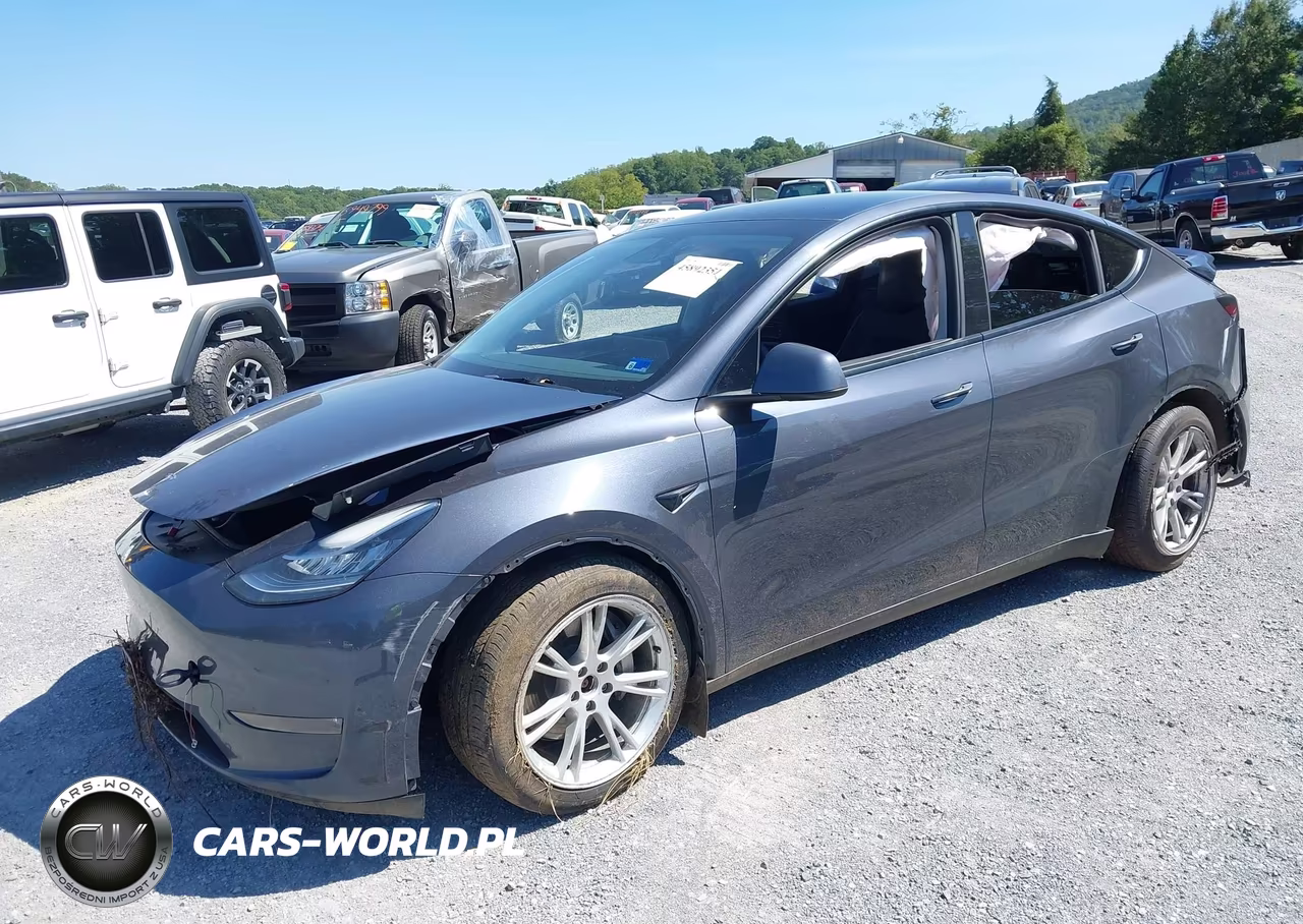 2023 Tesla Model Y Awd-Long Range Dual Motor All-Wheel Drive VIN:7SAYGDEE0PA054467 - 2