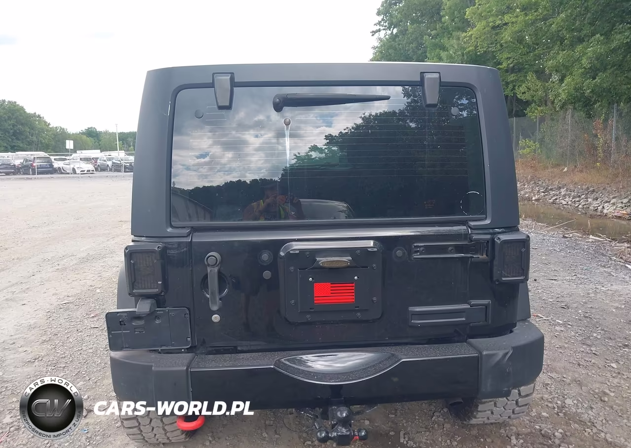2013 Jeep Wrangler Unlimited Sport VIN:1C4BJWDG7DL581257 - 16