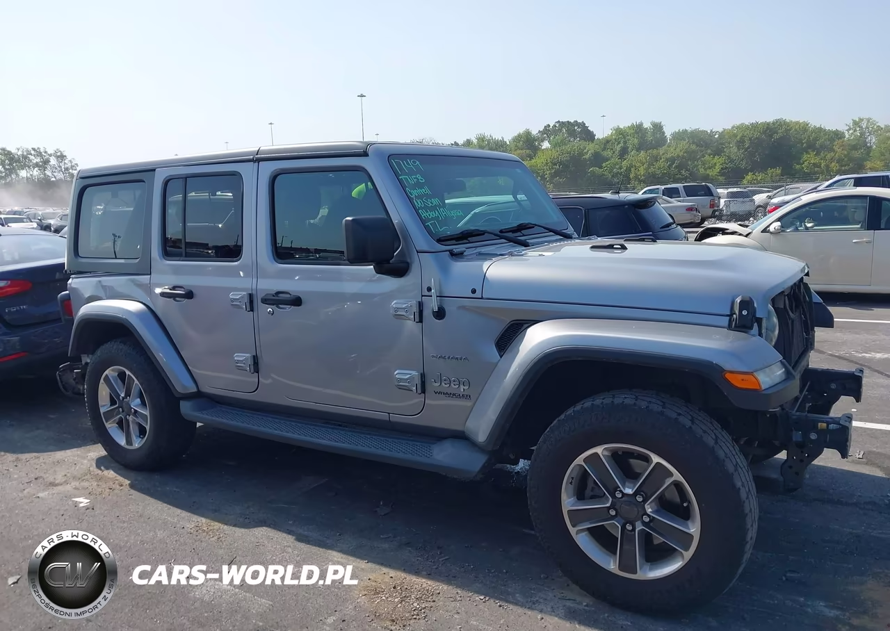 2019 Jeep Wrangler Unlimited Sahara 4X4 VIN:1C4HJXEN6KW567245 - 14