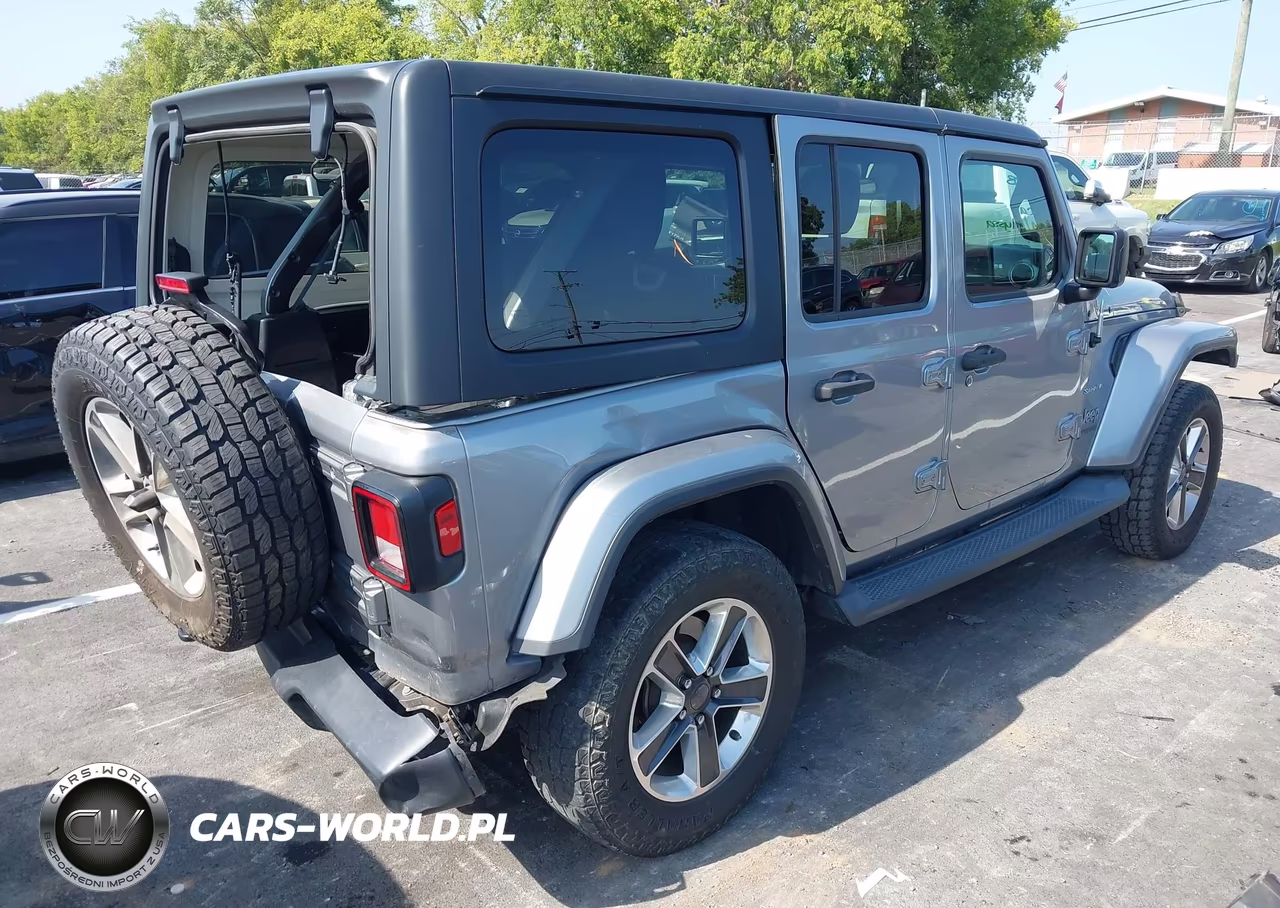 2019 Jeep Wrangler Unlimited Sahara 4X4 VIN:1C4HJXEN6KW567245 - 4