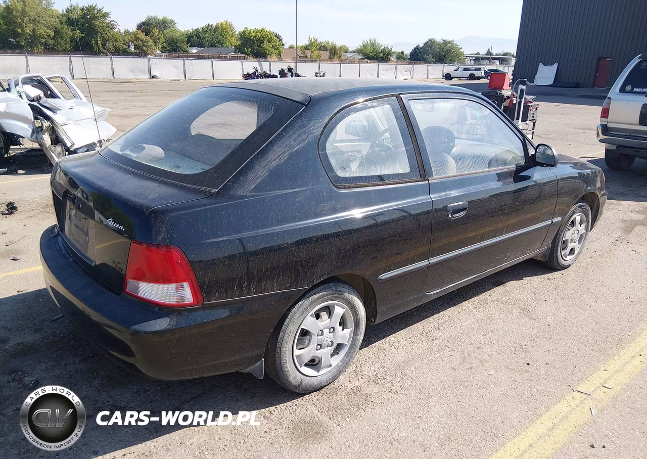 2002 Hyundai Accent L VIN:KMHCF35G92U228914 - 4
