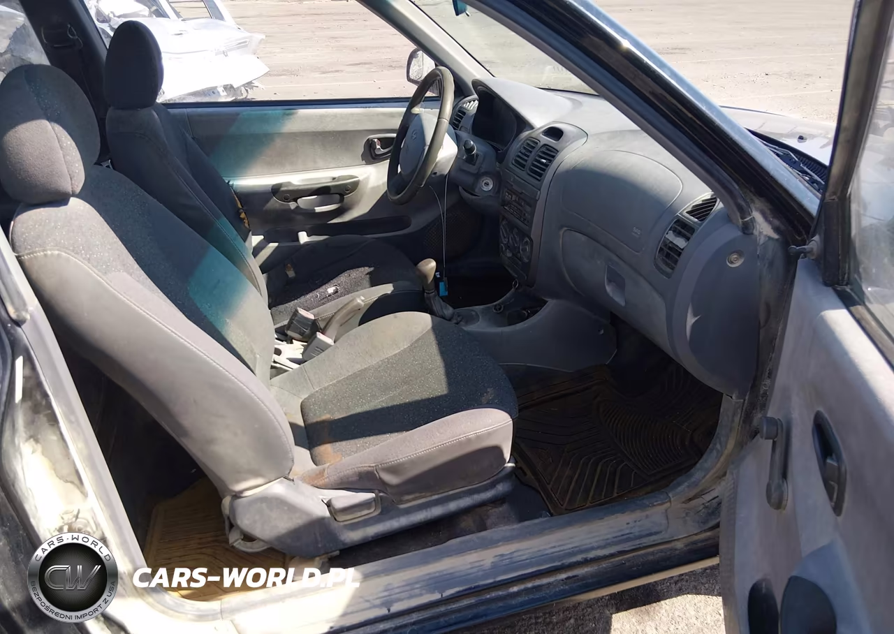 2002 Hyundai Accent L VIN:KMHCF35G92U228914 - 5