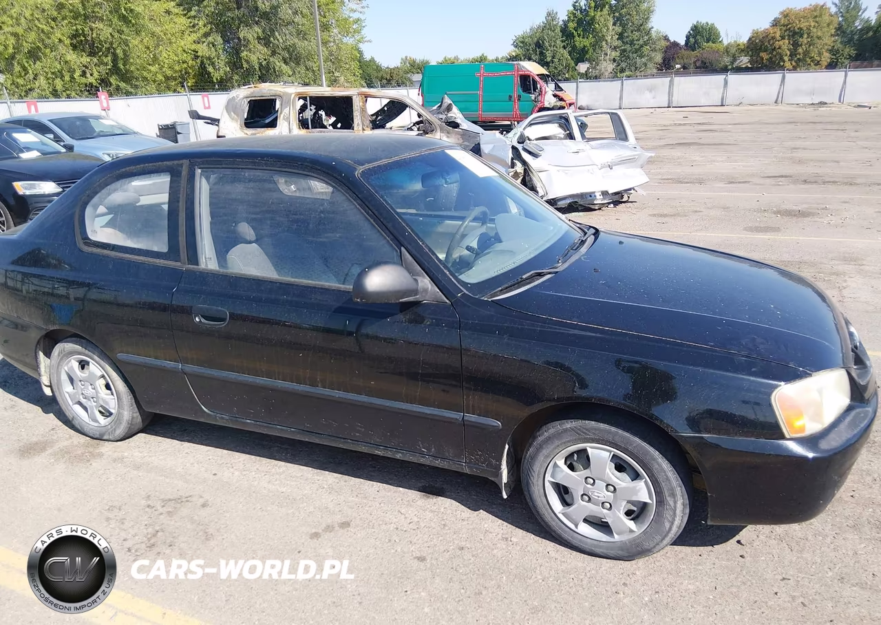2002 Hyundai Accent L VIN:KMHCF35G92U228914 - 6
