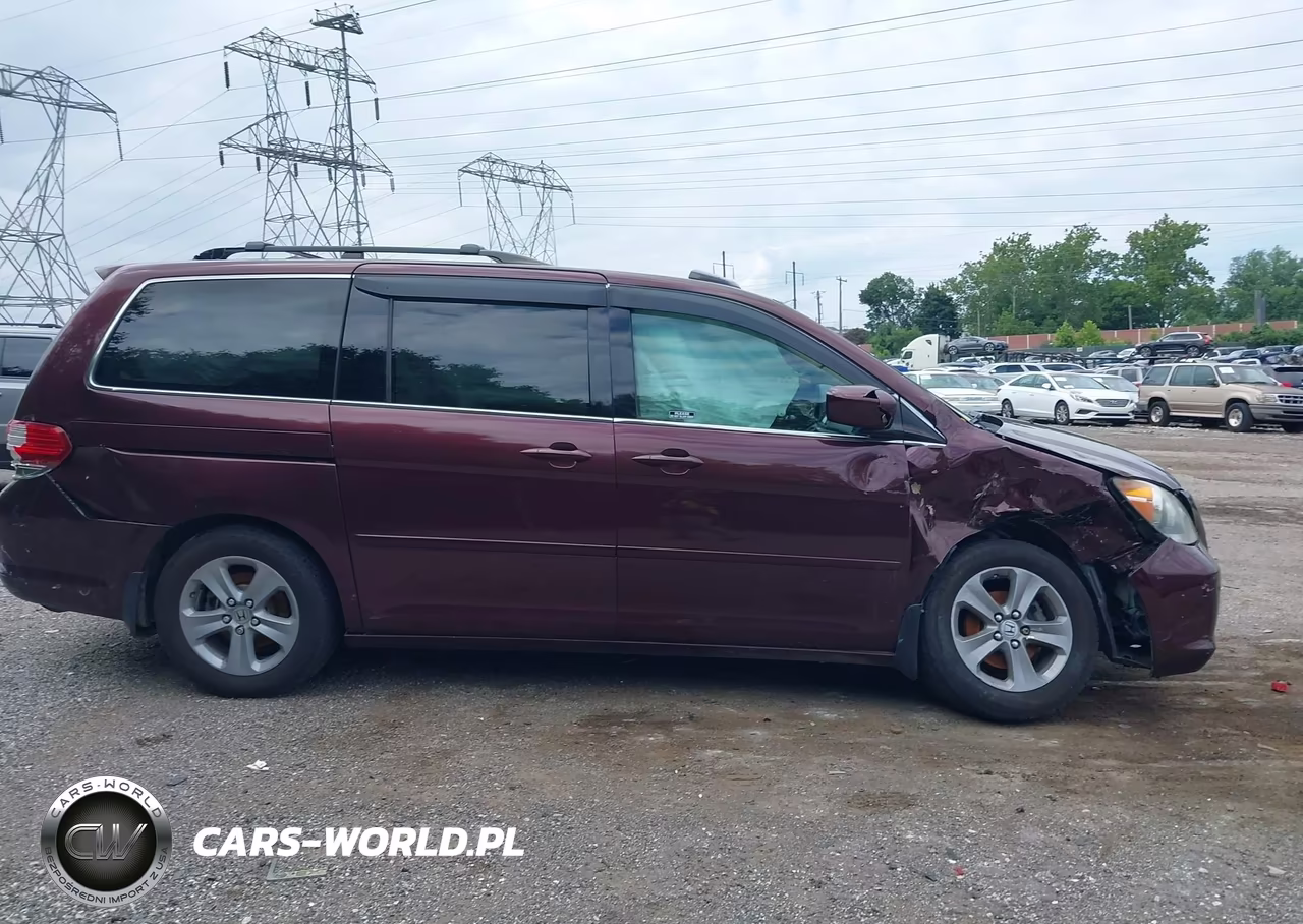 2010 Honda Odyssey Touring VIN:5FNRL3H95AB023120 - 14