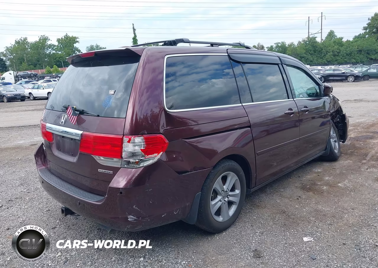 2010 Honda Odyssey Touring VIN:5FNRL3H95AB023120 - 4
