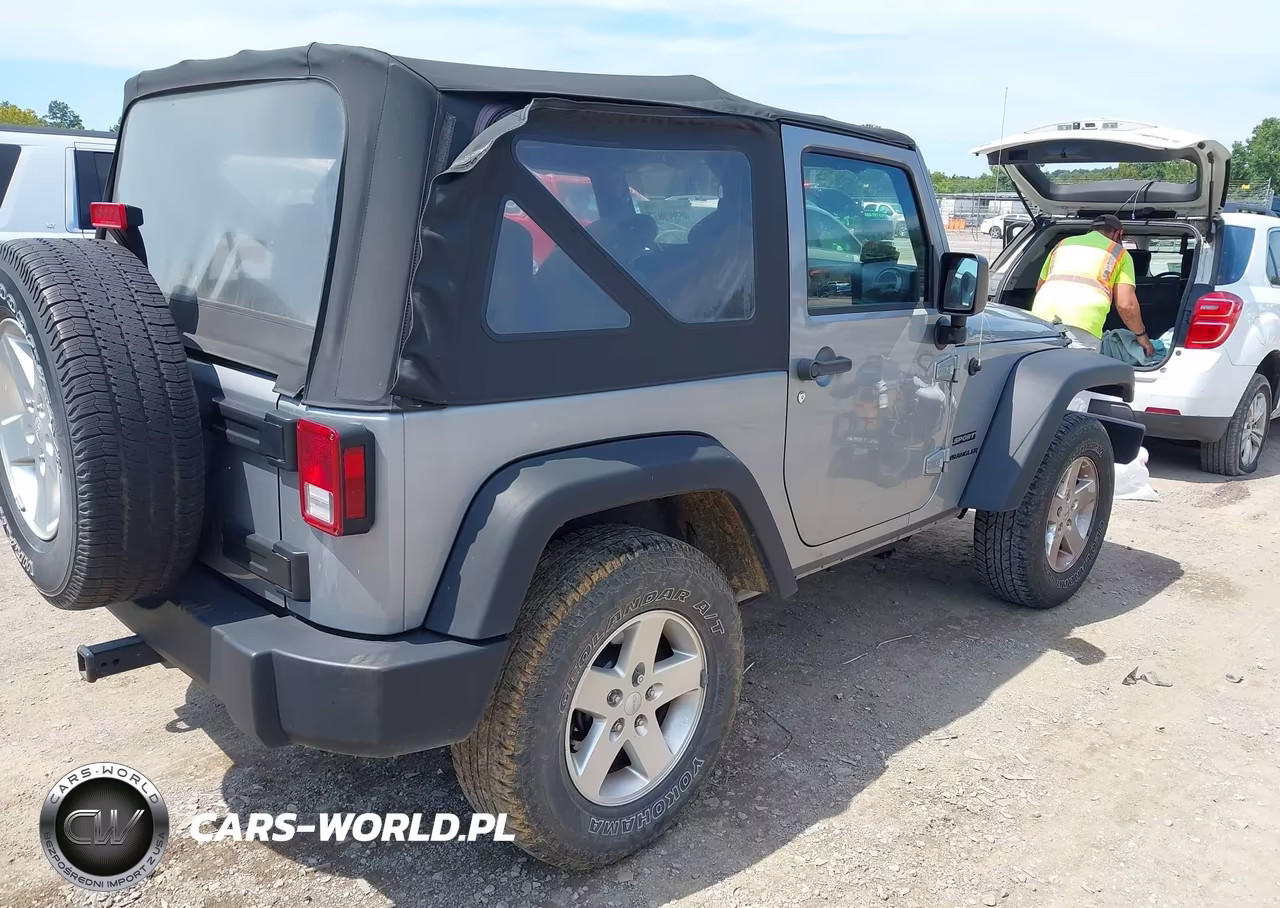 2015 Jeep Wrangler Sport VIN:1C4AJWAGXFL506961 - 4