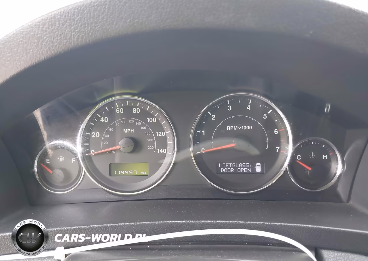 2009 Jeep Grand Cherokee Laredo VIN:1J8GR48K79C526700 - 7