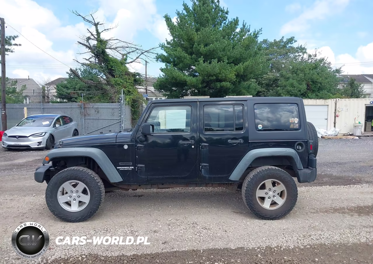 2011 Jeep Wrangler Unlimited Sport VIN:1J4BA3H19BL522173 - 14