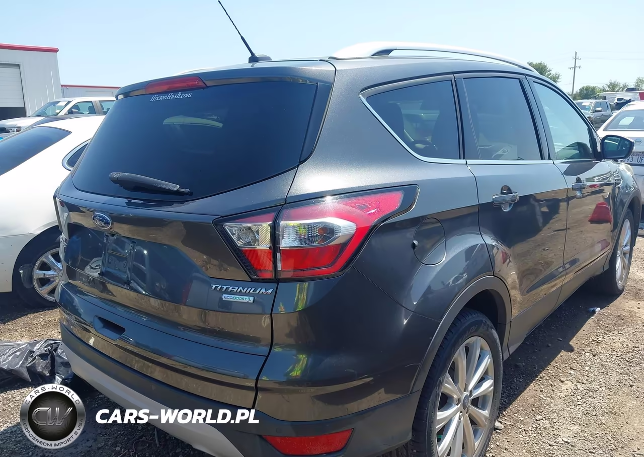 2017 Ford Escape Titanium VIN:1FMCU0J98HUC07072 - 4