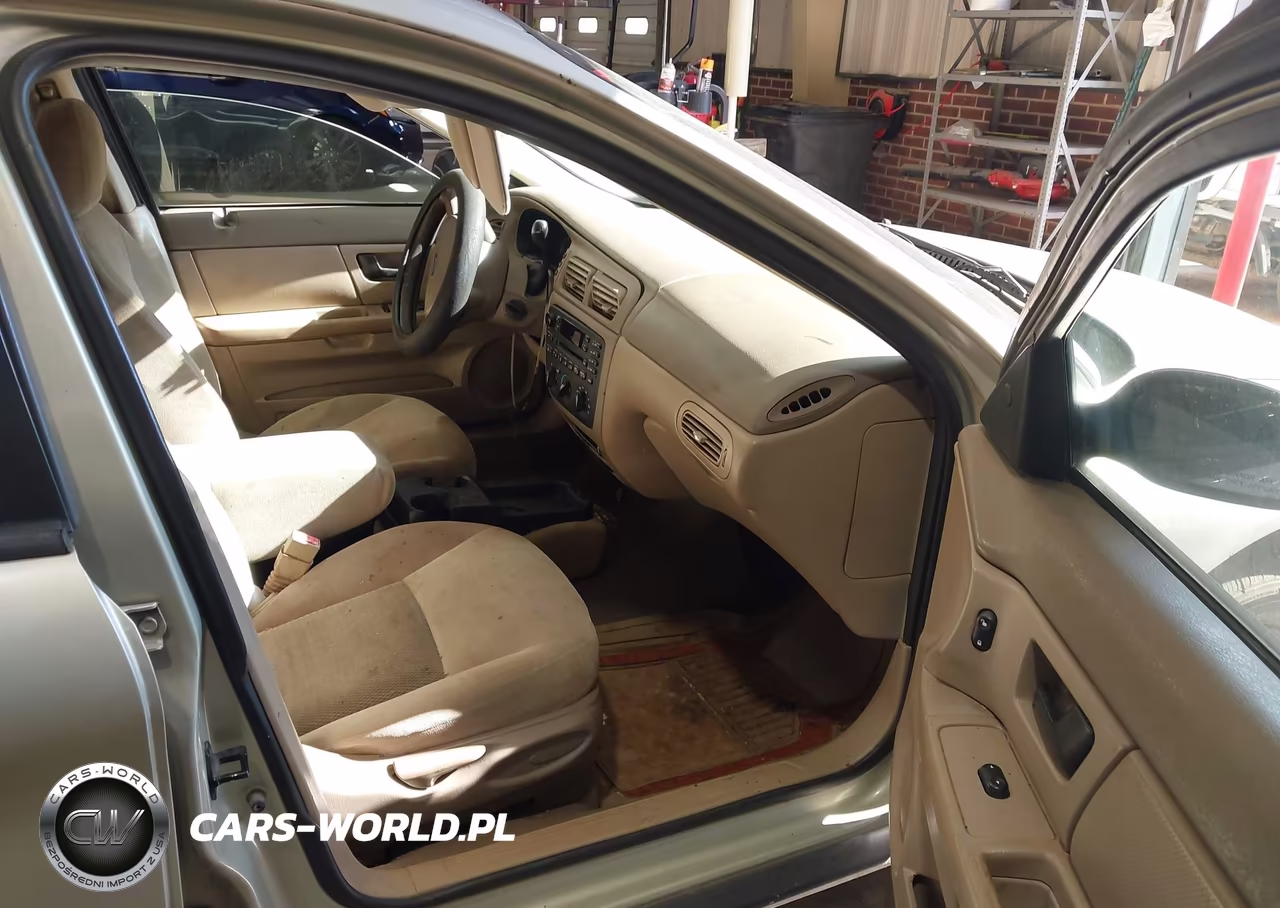 2006 Ford Taurus Se VIN:1FAFP53U06A148353 - 5