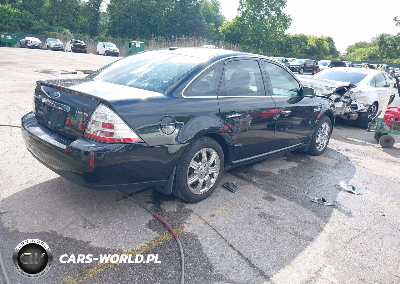 2009 Ford Taurus Limited VIN:1FAHP25W89G126981 - 4