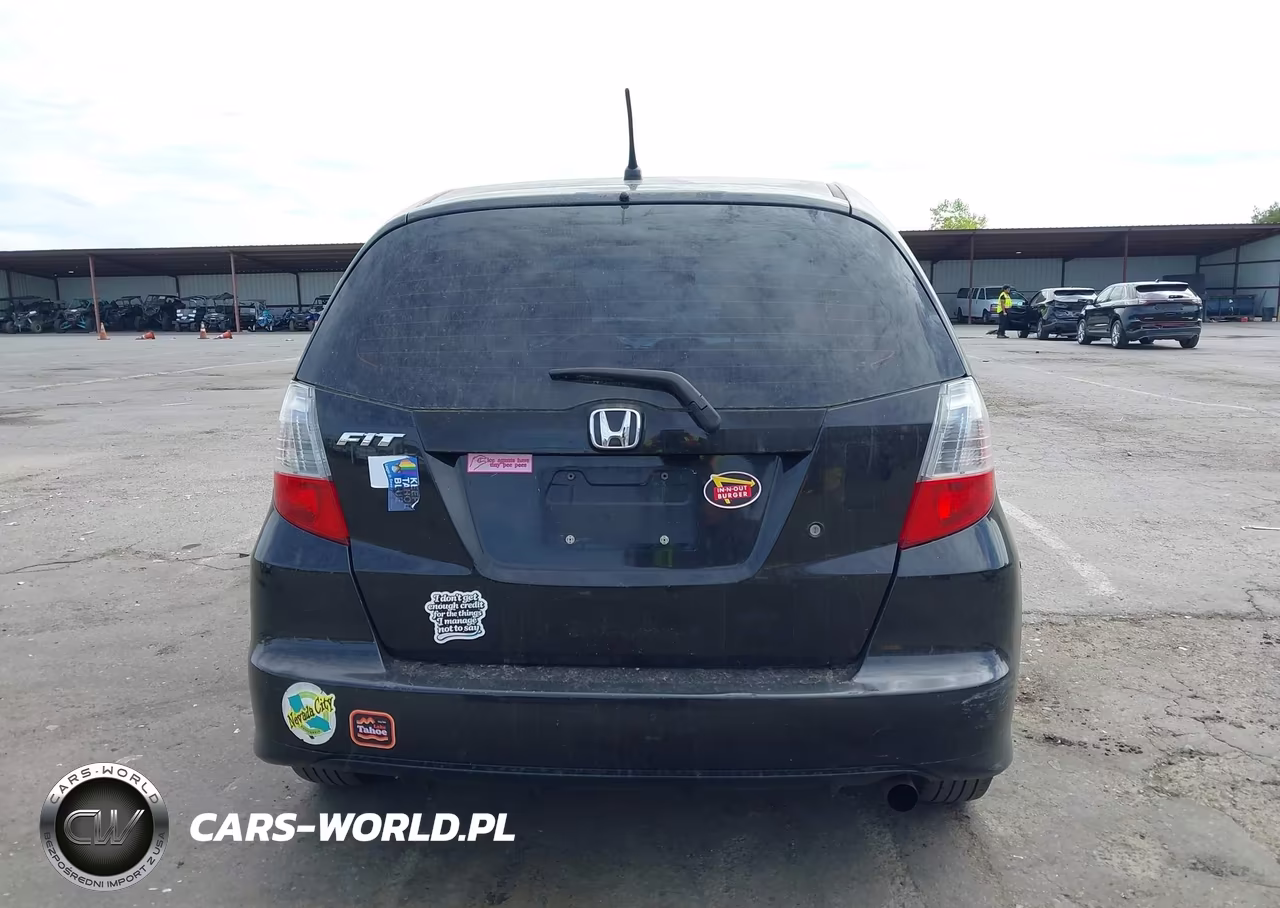 2009 Honda Fit VIN:JHMGE88249S058035 - 17