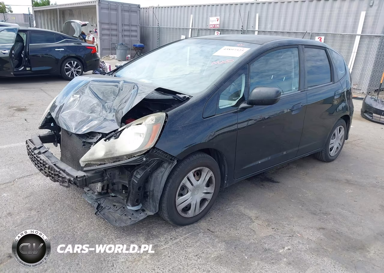 2009 Honda Fit VIN:JHMGE88249S058035 - 2